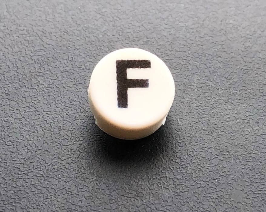 F Button Cap